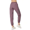 Yoga femmes entraînement Sport Joggers course pantalons de survêtement avec poche femmes Fitness pantalon doux Jogging pantalon H1221