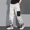 2021 Pantalon cargo de mode pour hommes Beau motif imprimé Pantalon streetwear ample Grande taille Pantalon de jogging décontracté Pantalon de survêtement 220212