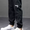 Pantaloni cargo hip-hop streetwear Pantaloni cargo da uomo imitati jeans Pantaloni Harun elastici Pantaloni da jogging Pantaloni grigi in primavera ed estate 211108