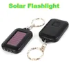 10 sztuk / partia Uaktualnij Solar Power Mini Latarka Brelok z 3 LED Light Solar Lampa słoneczna dla turystów turystycznych Camping Outdoor Lighting