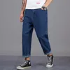 シンプルな男性の古典的なビジネスジーンズカジュアルな緩いハーランのズボンのビッグサイズの衣料品のための大きいサイズの服Pantalons de Grande Taille Pour Hommes