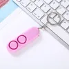 120dB Självförsvar Keychain Hängsmycke Utgående Tjejer Personliga Säkerhets Larm LED-nyckelringar KeyRing Anti-Lost-enhet