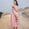 Robes décontractées Robe rose de fête haut de gamme Femmes Spaghetti Strap Satin Français Sexy Sling Printemps Été Cravate Tempérament Banquet Femme