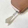 (En kaliteli) Padok değişim çantası tasarımcısı kadın madeni para anahtar torbası mini cüzdan fermuarlı kart tutucu kılıf düzenleyici çanta cazibesi pochette Accessoires