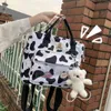 İnek Desenli Okul Çantaları Kadın İşlevli Sırt Çantası Kadın Trend Kawaii Okul Sırt Çantaları Yeni Moda Sevimli Sınıf Bookbag Bayan Y1105