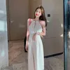 Sexy Halter Sleeveless Jumpsuits&Rompers White Casual Jumpsuits Women Summer Temperament High Waist Loose Straight Hollow Out 210429