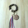 Comercio exterior pulsera personalizada artesanía cuentas de madera talladas llavero disco en blanco borla llavero colgante multicolor opcional