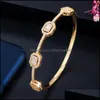 Bangle Armband Smycken Cwwzircons Luxury Stackable Statement Guld för kvinnor Bröllop Cubic Zircon Crystal CZ Dubai Sier Plated BG041 210408