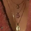 Colliers pendants Shuangr Women Collier Angel Heart Crystal Clicle Clicule Chaîne multicouche Gold Set Party Bijoux Gift