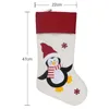 20% 47x22cm julstrumpor non-woven tyg gammal man snögubbe älg pingvin kreativ santa presentpåse godis dekoration penda