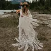 suknia ślubna długie rękawy flary