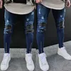 Itfabs nieuwste aankomsten mode heren gewassen geripte vernietigde jeans rechte vintage rafelige denim rits straat biker broek x0621