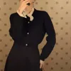 Costume de jupe à tricoter noire pour femme Vintage Pull Cardigan Manteau Cardigan + Taille haute Laine chaude Plissée Ensemble deux pièces d'hiver 210421