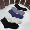 Calcetines con estampado de letras a la moda para mujer y hombre, medias largas de algodón de alta calidad para primavera, verano, invierno y otoño