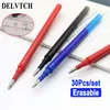 Delvtch 30 pcs caneta apagável reabastecimento de reposição escolar escola escrita de papelaria acessórios preto / azul / tinta vermelha caneta gel apagável 210330