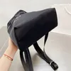 Zongzi Form rackpack Luxury Designer Нейлоновый материал для плеча Классическая печать рюкзак на молнии Черный белый карман180y