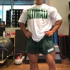 男性緩い大きなサイズTシャツの綿プリントランニングスポーツジムフィットネストップトレーニングスポーツウェアジョギングティートレーニング服メンズTシャツ