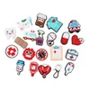 30 Pcs / Lot Mode Porte-clés Mélanger Conception Infirmière Médicale Accessoires Stéthoscope Coeur Pilule Rétractable En Caoutchouc PVC ID Porte-Badge Bobine Pour Cadeau