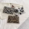 50 sacchi di roba da donna PU leopardo mucca stampa busta con cerniera colore misto