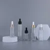 Bouteille de parfum d'huile essentielle en verre givré clair Réactif liquide Pipette Contenant compte-gouttes 20 ml 30 ml 40 ml 50 ml 60 ml 80 ml avec couvercles en or noir blanc argenté