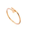 Bracelet en acier en titane sans diamant et ongles en acier Bracelet Men039s et femmes039 en acier inoxydable rose go8170619