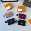 Kvinnor väska plånbok handväska äkta läder mynt handväska korta plånböcker Polychromatiska plånböcker Lady Card Holder Classic Mini Zipper Ficka med Orange Box