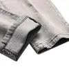 Pantalones vaqueros para hombre Homme Designer Hombres lavados rectos Pantalones de mezclilla de algodón rasgados para el diseño de parches clásico