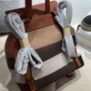 Designer sac à dos seau épaule femmes voyageant mode Patchwork Plaid Tartan toile chaîne Grain cuir haute qualité Lad334x