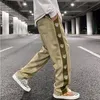 Hip-hopowe zamszowe haftowane litery na co dzień spodnie męskie proste kolorowe bloki ściągane sznurkiem luźne spodnie główna ulica, aby śledzić męskie