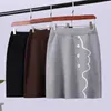 Simple Strokes Avatar Jacquard Knitted Skirt Women Casual Button High Wasit Hip Female Sweet 210520