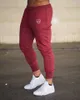 Mens jogger spår byxor man gym träning fitness bomull byxor manlig casual mode skinny sweatpants