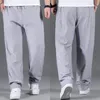 Pantalons pour hommes grande taille hommes joggeurs décontracté Baggy Fitness hommes survêtement pantalon de survêtement droit ample gris gymnases survêtement pantalon XL-8XL