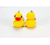 Creative LED Yellow Duck KeyChain med Sound Animal Series Rubber Ducky Key Ring Toys Doll Gift9860255