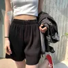 Kvinnors vidsträckta shorts är tunna och hög midja koreanska stilpläterade lösa casual fempunktsbyxor 210429