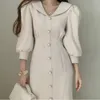 Ezgaga franska stil sjöjungfrun klänning kvinnor vintage pärla knapp v-nacke smal midja puff ärm elegant damer chic solid vestidos 210430