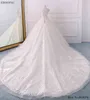 Szlachetne suknie kulowe Plus Size Sukienka Kaplica Pociąg Bride Wedding Scoop Neckline Krótkie rękawy Ves Tidos de Novia z koralikami