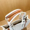 حقائب تسوق نسائية غير رسمية بطباعة حروف حقائب مسائية مخططة سعة كبيرة حمل حقيبة يد يابانية من القماش