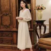 Élégante douce femme robes Style français Vintgae bouffée à manches longues abricot col en v en mousseline de soie avec bouton 13231 210506