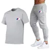 Designer 2021Neuer Herren-Trainingsanzug, zweiteilige Sets, kurze Ärmel und Hosen mit gestreiften Buchstaben, modischer Stil, Frühling, Sommer, Outwear, Sport-Set, T-Shirt-Anzug