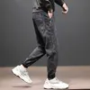 Mode Streetwear Männer Jeans Schwarz Grau Elastische Lose Fit Denim Harem Hosen Koreanischen Stil Hip Hop Breite Bein Kleine Hosen