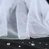 Véus nupciais U2JF 1 Camada Véu de Casamento com Pente Tubo Espumante Grânulos Adorno Borda Curto Comprimento da Ponta do Dedo Corte Tulle3518273