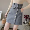 Fashion Autumn High Waist Elasticity Woolen Plaid Skirt A-line Button Bow Winter Sweet Mini Plus Size 7748 50 210510