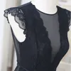 Französische Marke Sexy transparenter Frauenoverall schwarzer Bodysuit weiblicher aushöhlender Spitzengaze ultradünner Playsuit-Tropfenverschiffen 210401