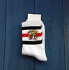 Männer Frauen 2pcs 1 Los Baumwollsocken Tiger Kopf Stickerei Retro Striped in Rohrsocken lässige schwarze schwarze weiße Strümpfe Unisex