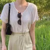 女性Tシャツ夏のシンプルな穏やかなキャンディーカラーラウンドネックバックルオールマッチぬいぐるみ半袖ルースニットセーター210514