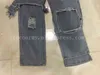 不規則なリッピングホールデニムパンツ女性男のプラスサイズのストレートテックウェアブラックジーンズパンクKPOP原宿ストリートウェアヒップホップファッション220115