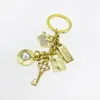 Keychain Key Rings Chapstick Wrap أحمر الشفاه غطاء فريق Lipbalm دافئ / الجملة وضع أزياء المفاتيح