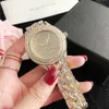 Zegarki marki kobiety dziewczyna diament kryształ duże litery styl metalowy pasek ze stali kwarcowy zegarek na rękę GS 42