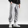 Höst Ly Fashion Casual Pants Män Loose Fit Side Knappar Stäng Designer Basketbyxor Hip Hop Joggers Sweatpants