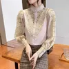 Crochet creux dentelle couture Style coréen Blouse femmes Sexy manches bouffantes col montant fond mince chemise 12731 210427